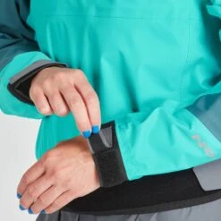 NRS Women's Helium Splash Jacket 16 NRS Women's Helium Splash Jacket -Outdoor Sports 20036 02 MediterraneaAqua Model Cuff 070821 1000x1000