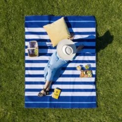 CGear Sandlite Sand-Free Mat | NRS -Outdoor Sports 71436 01 navy blue stripe model 011619 1000x1000